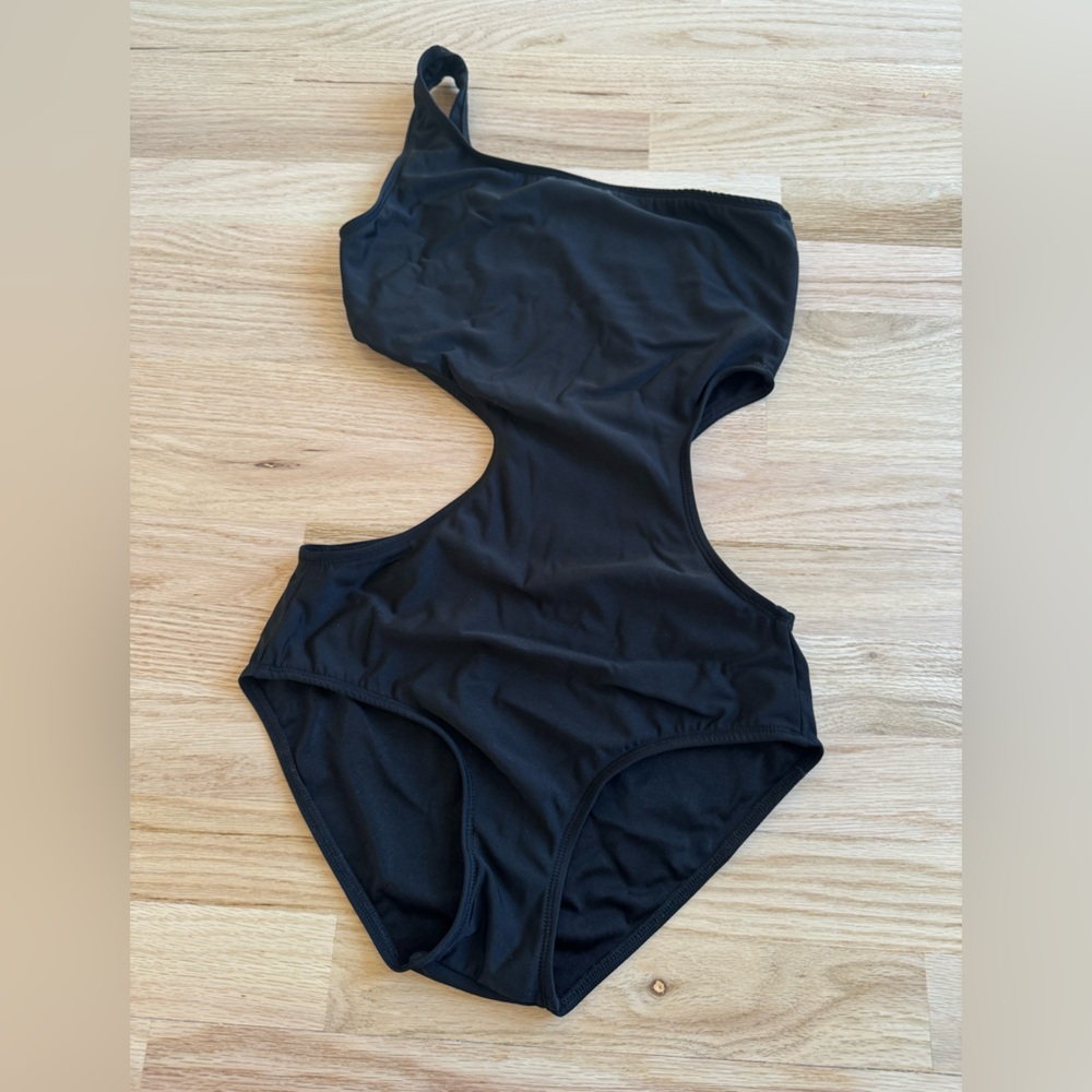 Never worn one piece swimsuit 
Made in Ukraine 
Amazing quality 
Small size